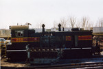 250 at Bluffs, next to a derelict Alco 12 cyl. 251 engine.