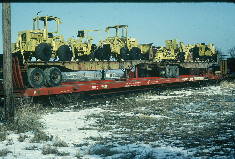 IRRC flat with UP flatbed trailers at Atlantic, 1-8-83, Rik Anderson photo.