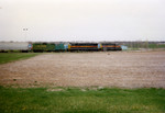 Perhaps the rarest consist ever seen on JM's spur, 900/801/303 switch the plant.  Sorry about the poor quality of this photo, but it's one of my favorites.  May 2, 1996.