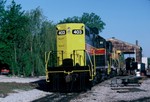 403 and 402 in brand spankin' new paint along with 309 on the east engine house track. 10-May-1988.