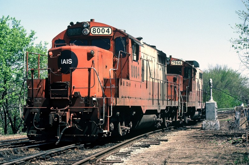 8004 and 7966 handle switching chores. Iowa City, 22-April-86. Nice shot of the old phone call box with wires still attached.