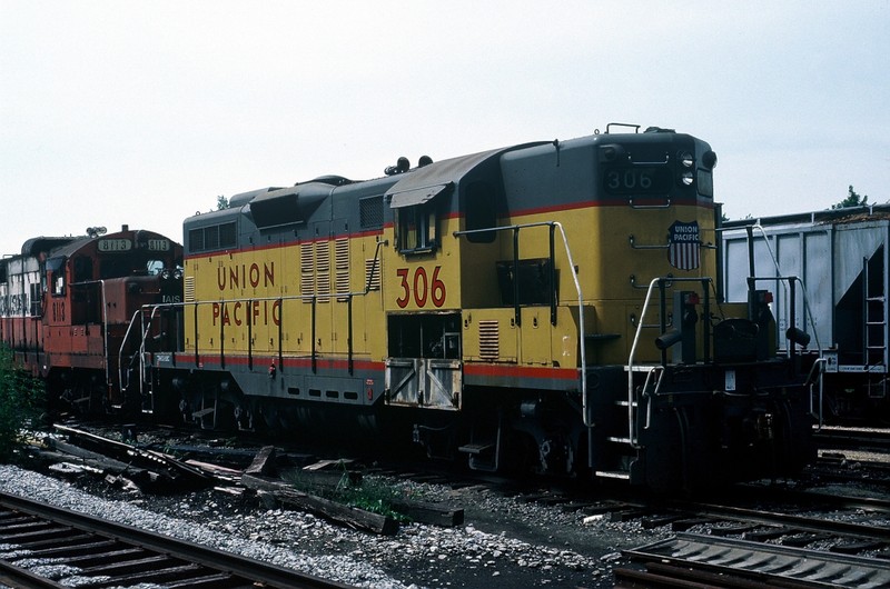 Ex-UP 306 and 8113 in the Iowa City yard. 13-August-1986.