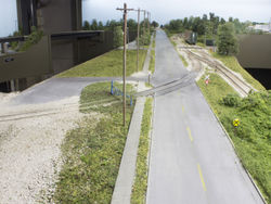 The PDM Spur takes a tight curve across Swanson Blvd to reach the plant. Conductors will flag the crossing when switching CB&I.