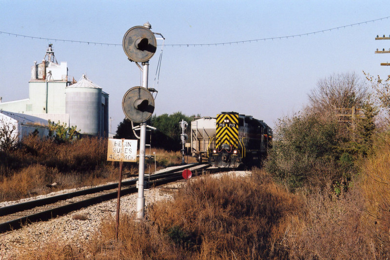 West train's power pulling out of the east end of Atlantic siding, to run around their hoppers.