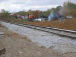 Looking east, at Berman's, mp301 east of Grinnell, with a couple IAIS 6500s being loaded.  Oct. 24, 2005.
