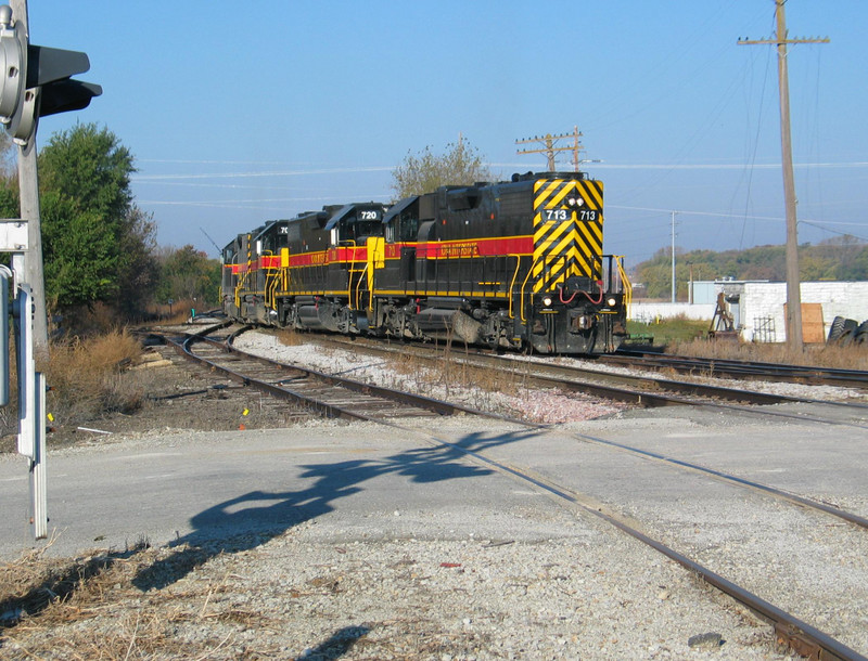 West train power backing through the crossover west of the Depot at Atlantic, to run around their hoppers.  Oct. 25, 2005.