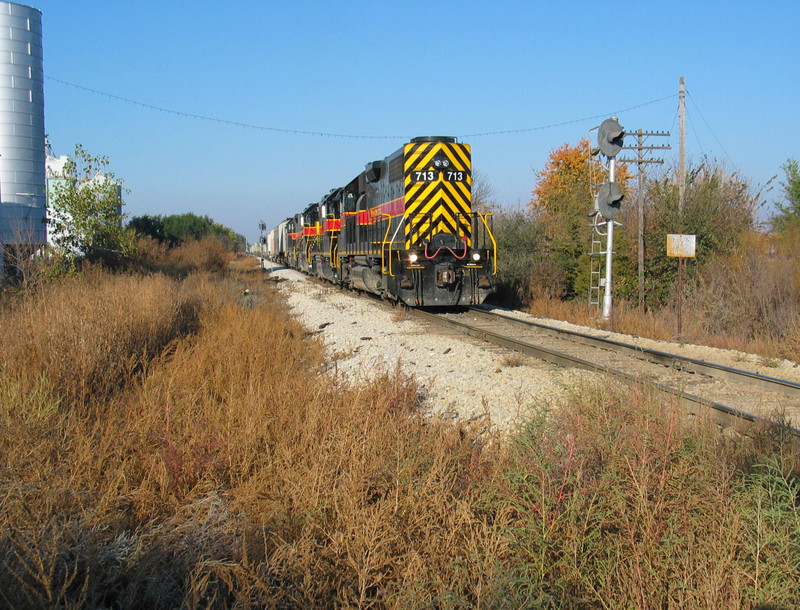 Power coupling onto the east end of the hoppers at Atlantic, getting ready to shove up to Harlan; Oct. 25, 2005.  This switch was the start of CTC into the Bluffs in RI days.