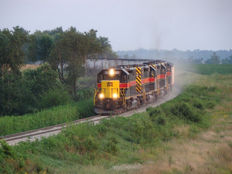 The ICCR crests the hill southwest of Walford, Iowa with NOKL hoppers,  07/26/2008.