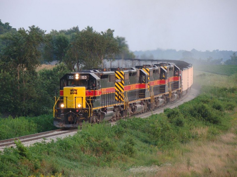 The ICCR crests the hill southwest of Walford, Iowa with NOKL hoppers,  07/26/2008.