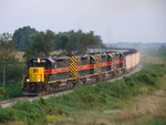 The ICCR crests the hill southwest of Walford, Iowa with NOKL hoppers,  07/26/2008.