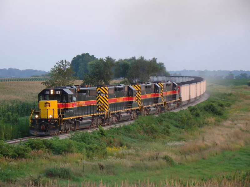 The ICCR crests the hill southwest of Walford, Iowa with NOKL hoppers,  07/26/2008.