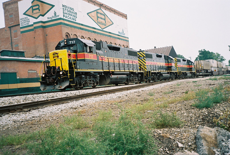 Westbound at Mo. Div. Jct. (Taylor St.) Davenport, June 29, 2005.  Second car is an AOK loaded with CSXU containers.
