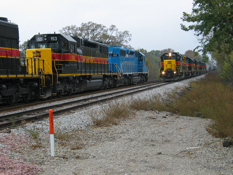 Looking west, the turn is heading down the main while the eastbound pulls up the siding, Oct. 26, 2007.